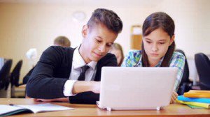 stock-footage-young-students-typing-at-laptop-then-showing-thumb-up-sign-ok-300x168-3797668